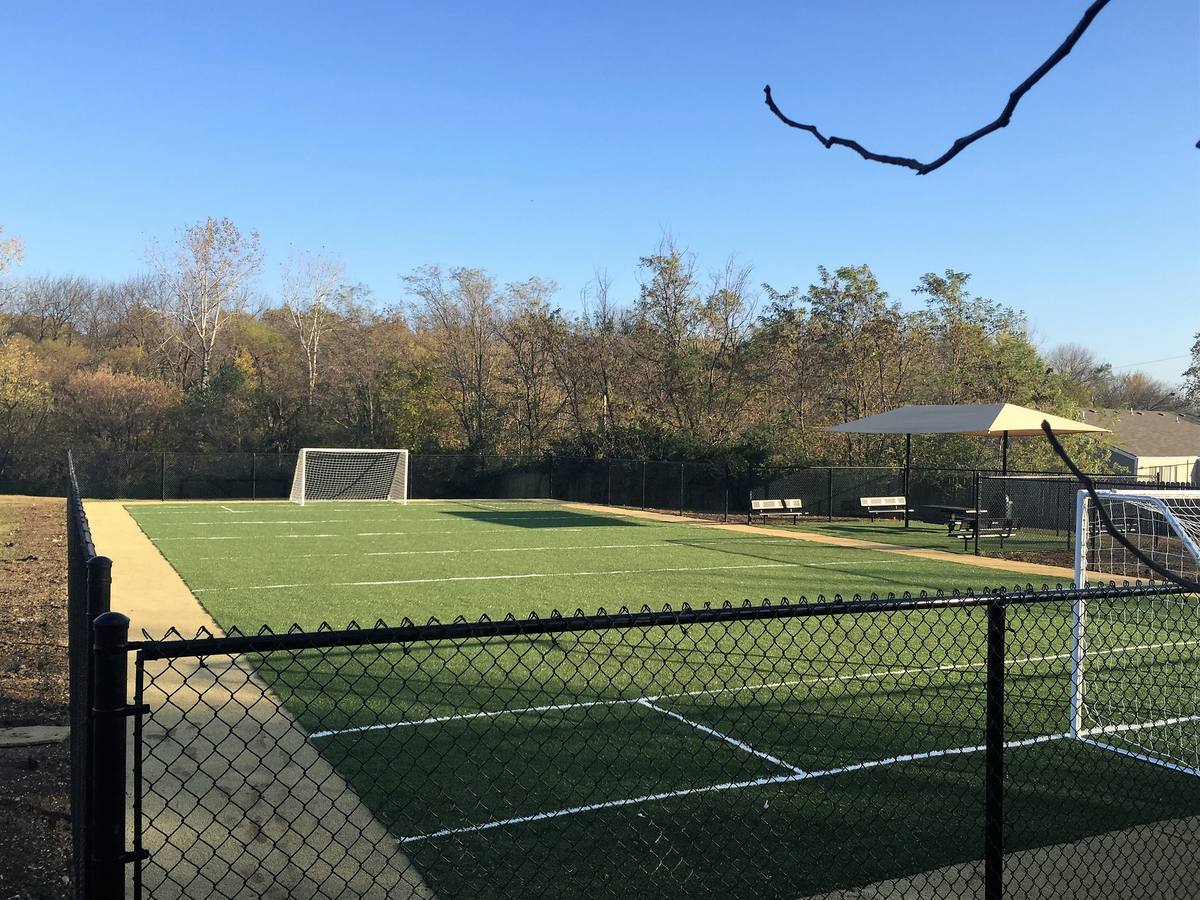 SportsGrass synthetic athletic field with soccer goal at Rockland Apartments in Lawrence, KS